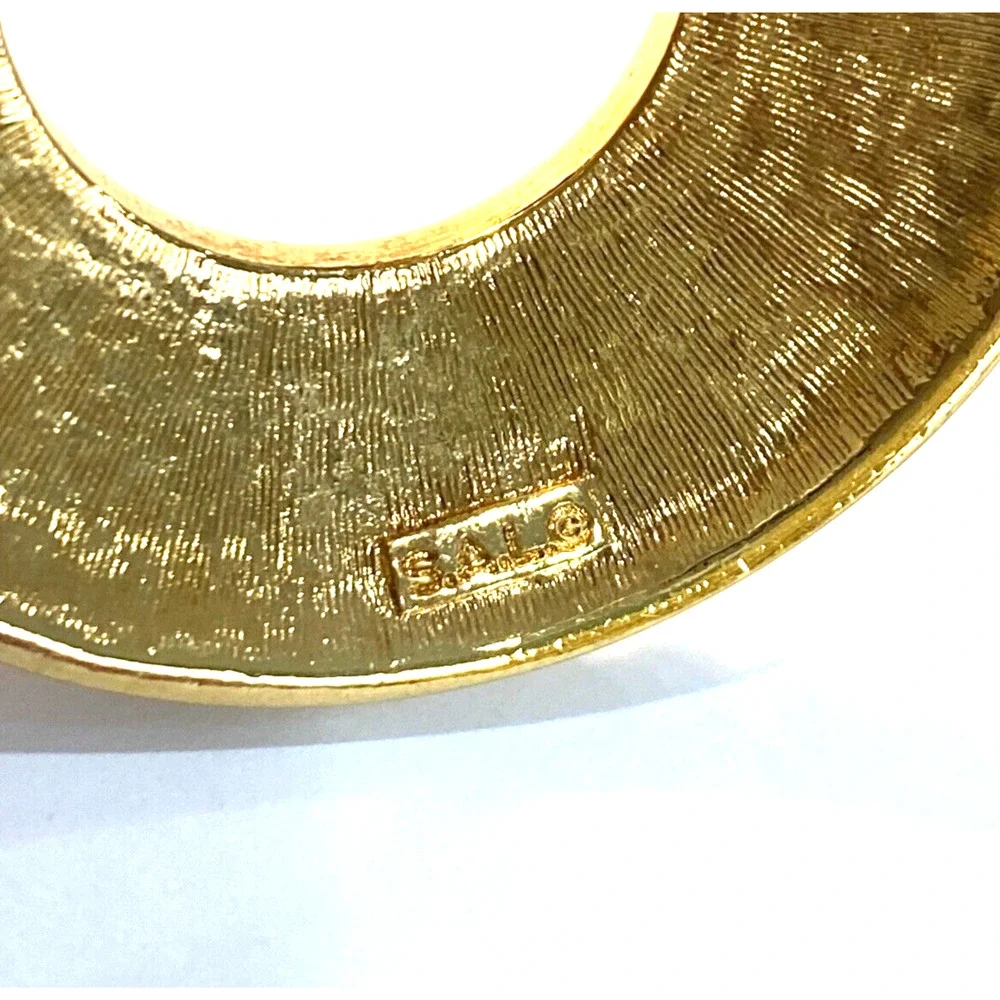 Vintage Swarovski brooch SAL goldtone textured open circle round retro pin 1980s